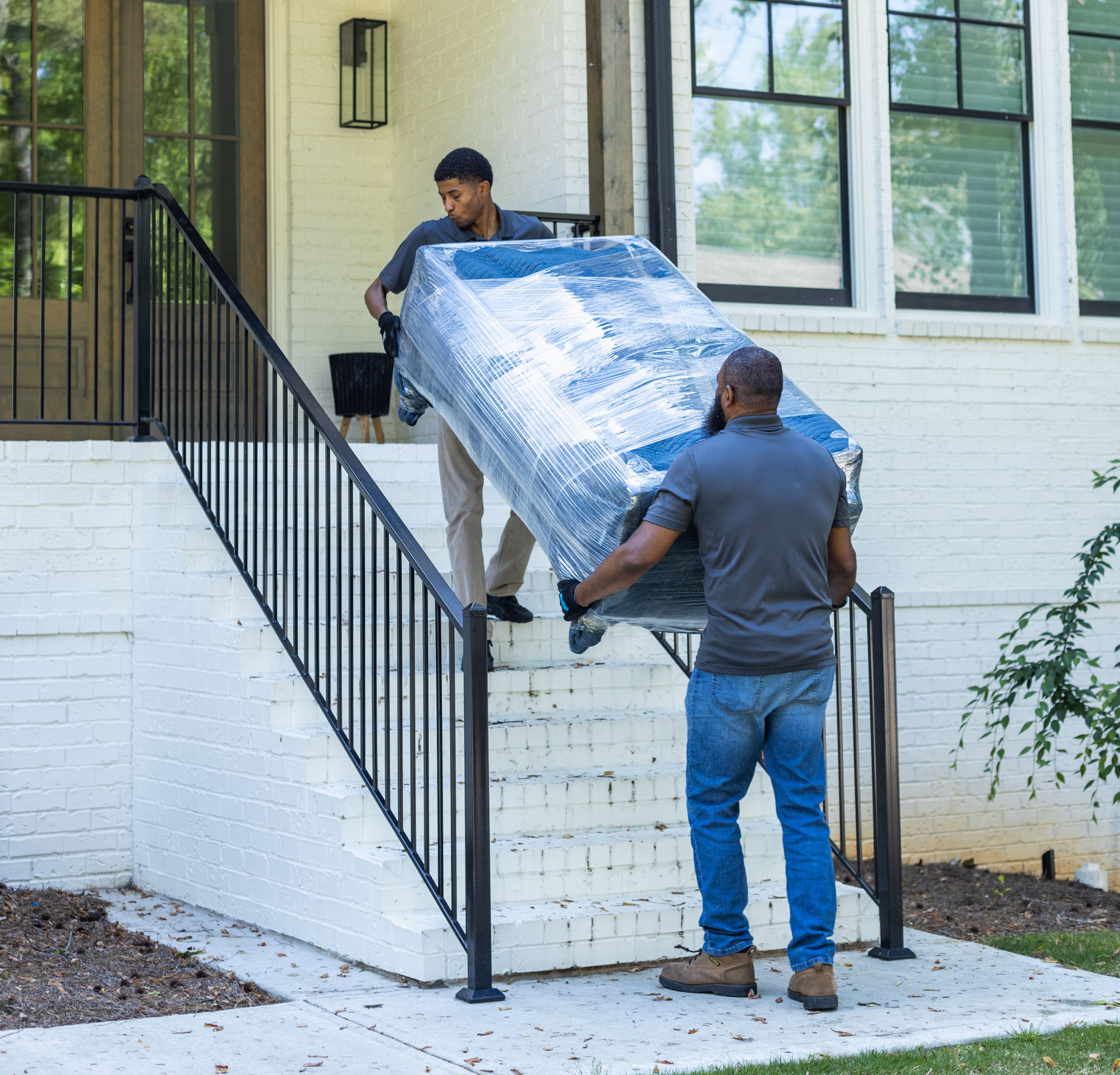 Blanket wrapped sofa on stairs